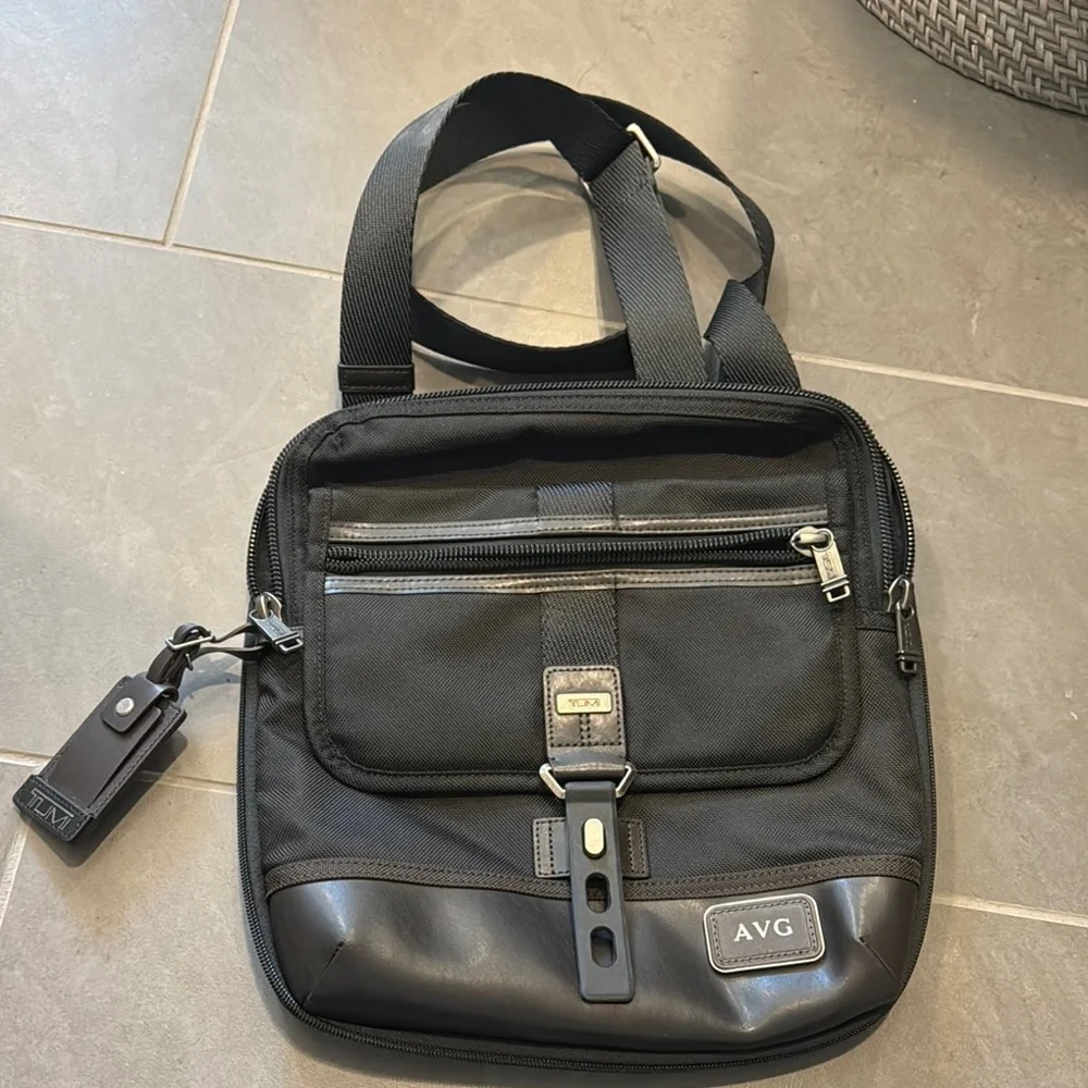 Tumi Black Messenger Bag with Adjustable Straps and Durable Fabric - Picture 1 of 7